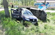 Accident la Dragalina! Bărbat rănit după ce două mașini s-au răsturnat în afara părții carosabile - FOTO