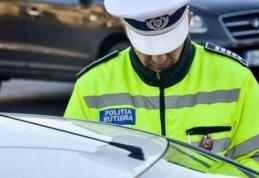 Șofer oprit de polițiști văzând că nu mai poate ține drumul drept